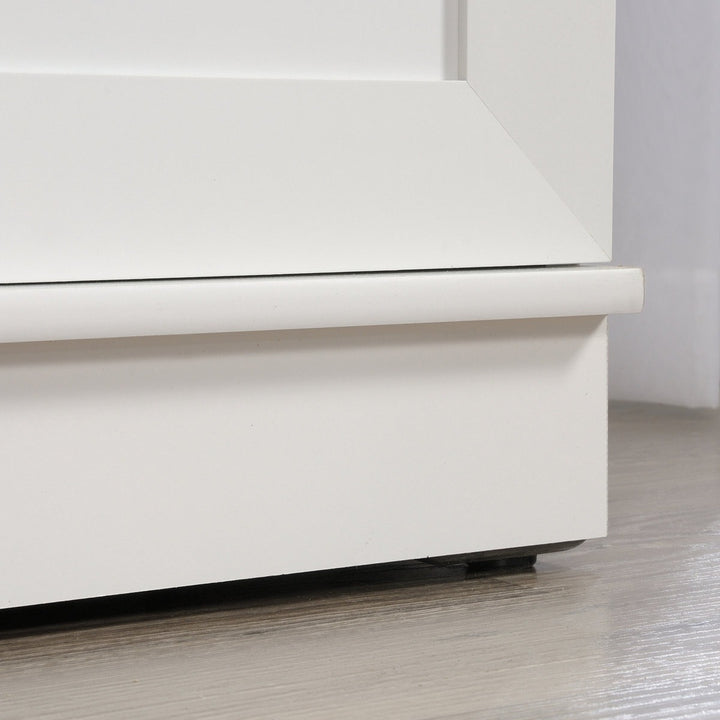 Close-up of a white wardrobe with a smooth finish on a wooden floor.