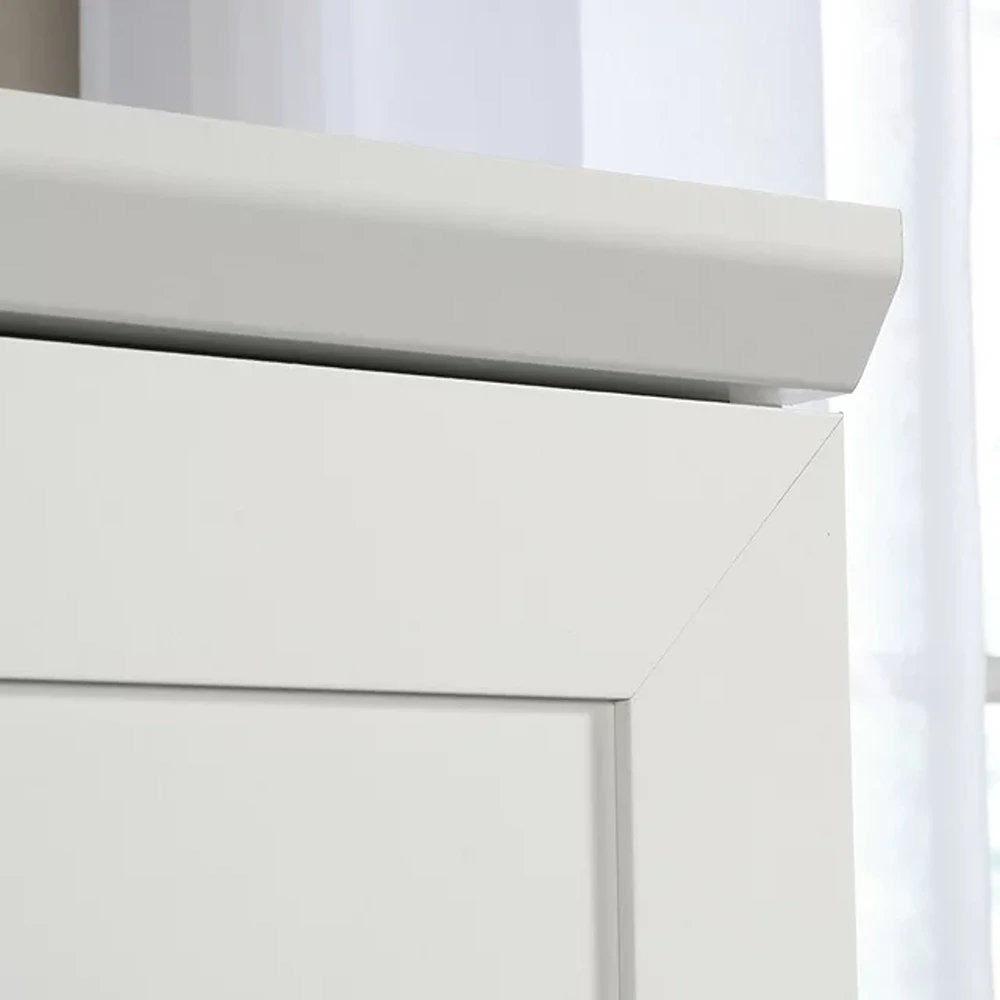 Close-up of a white cabinet with a smooth finish