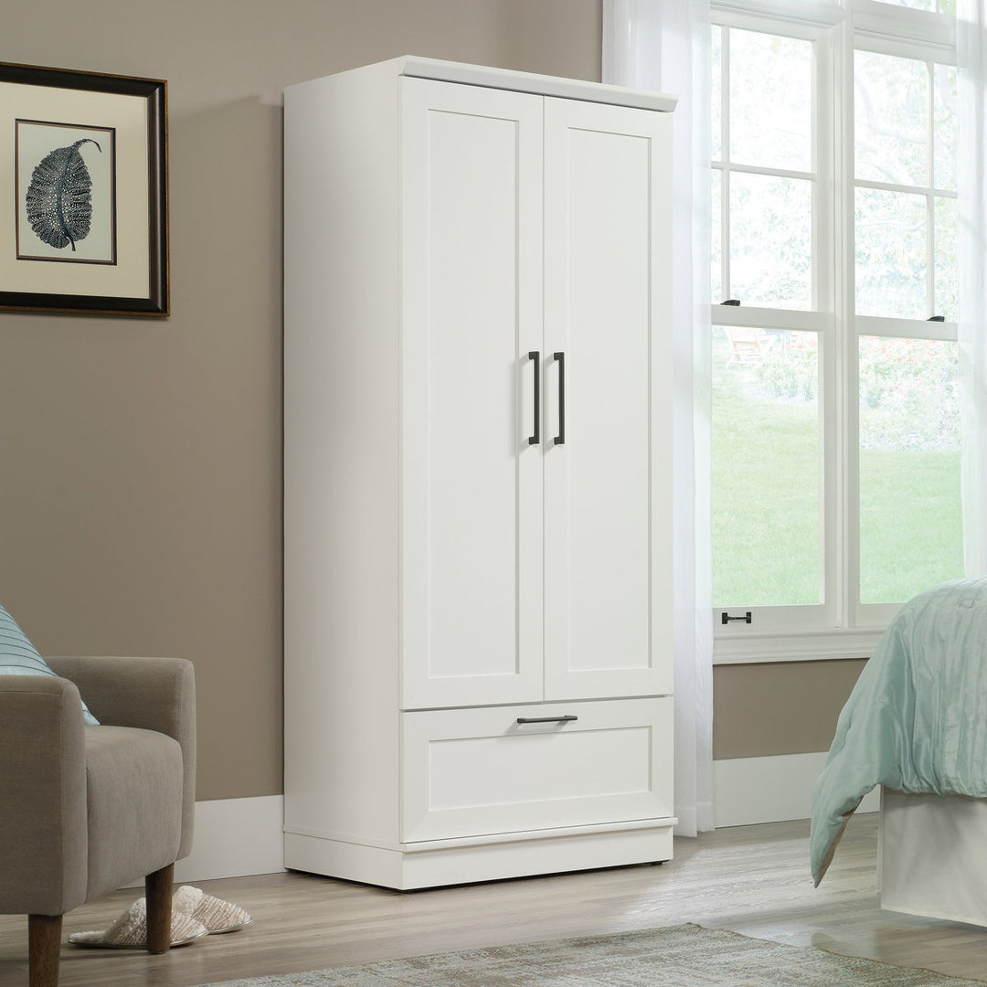 White 2-door wardrobe in a room with a window and furniture. Customization is available