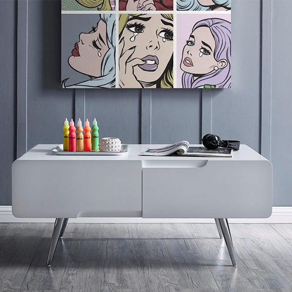 A white high-gloss coffee table with two single drawers, featuring a modern design and placed in a living area setting with decorative items on top.