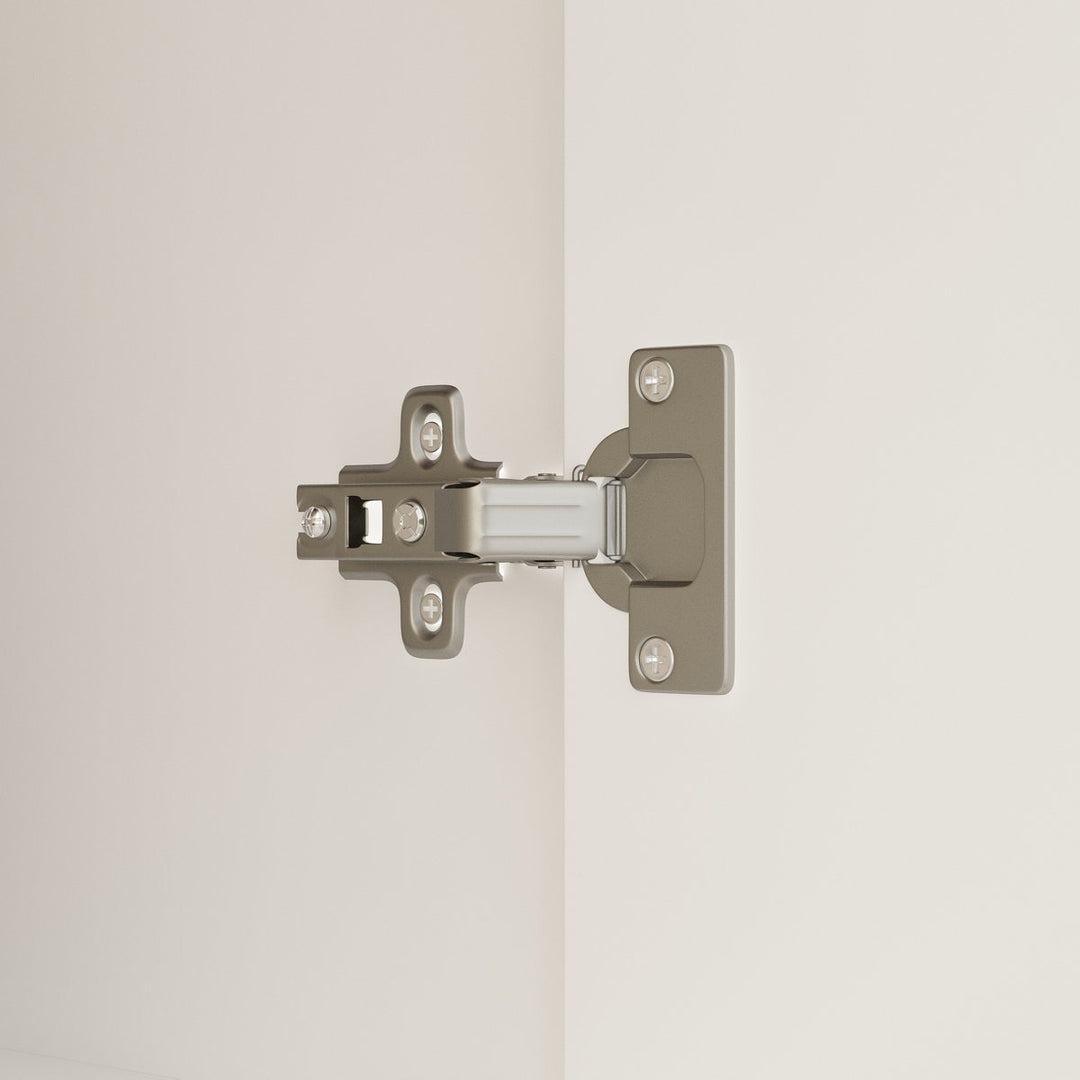 Metal door hinge on a neutral background