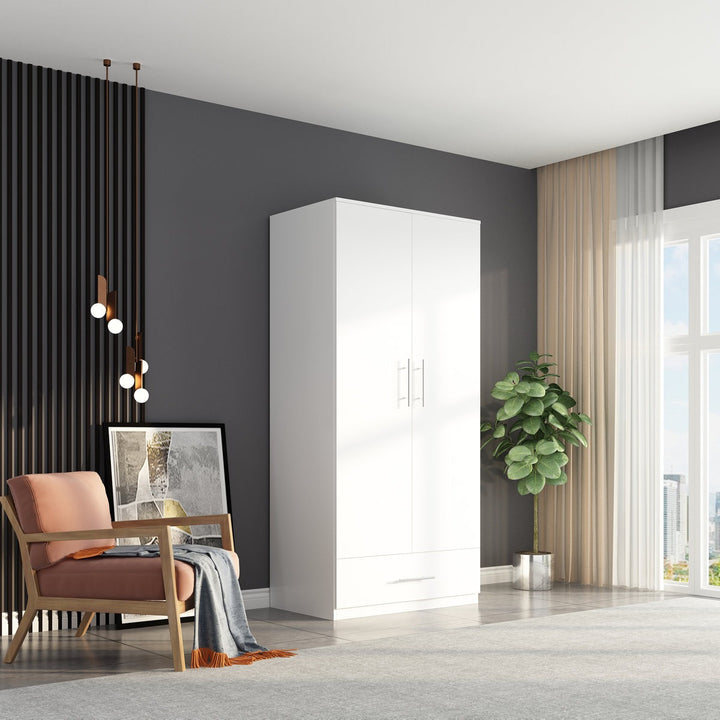 Modern room interior with a white wardrobe, chair, and decorative elements.