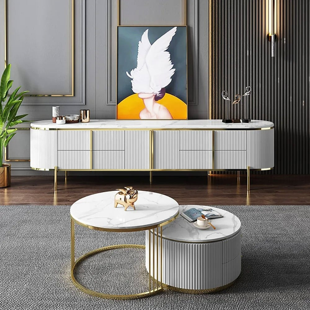 A stylish white tv stand with gold legs and handles and a marble top looks luxury storage in a living