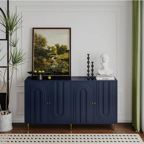Blue Corbin sideboard placed in a modern living space, styled with decor items and accessories on top