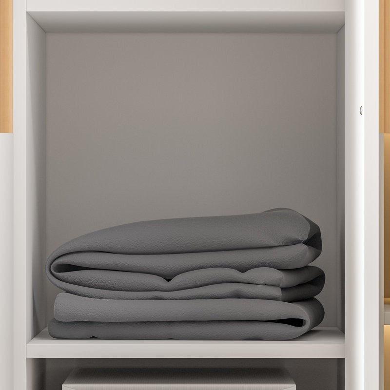 storage compartment of a white-finish wardrobe design.