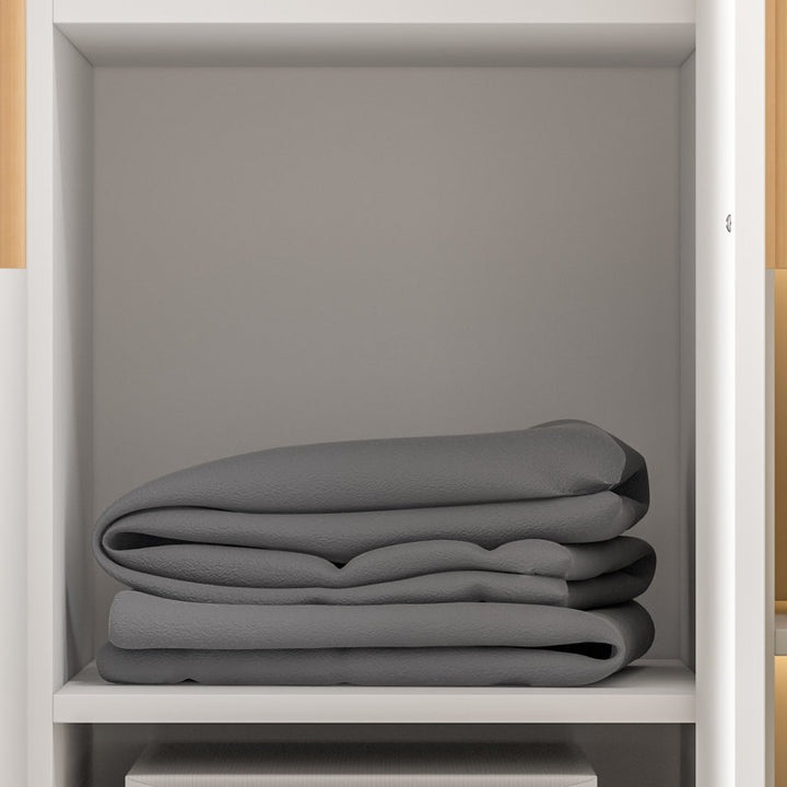 storage compartment of a white-finish wardrobe design.