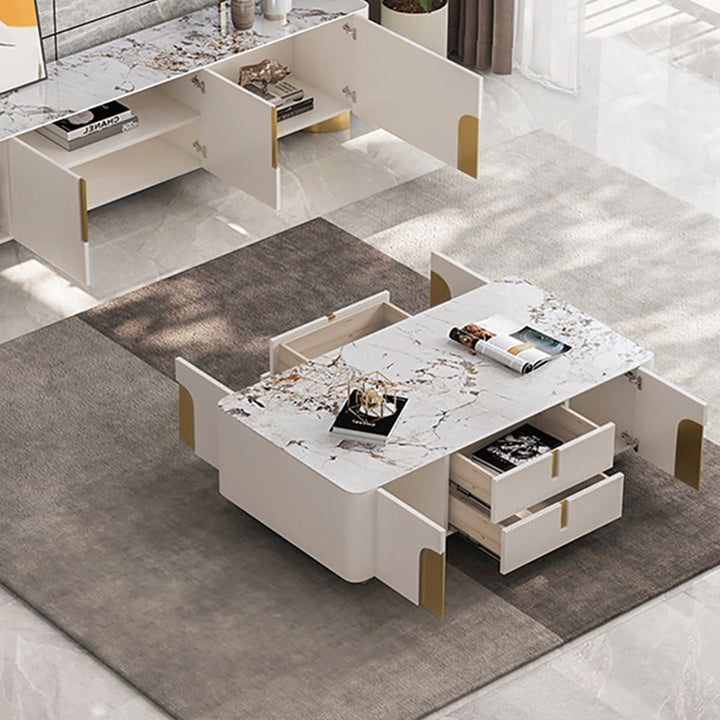 Modern beige coffee table featuring smooth pull-out drawer design with gold handles and hidden storage space.