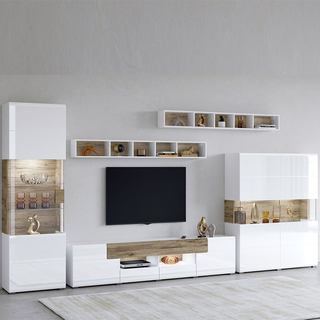Modern living room with white and beige entertainment center that contains a 5-piece set