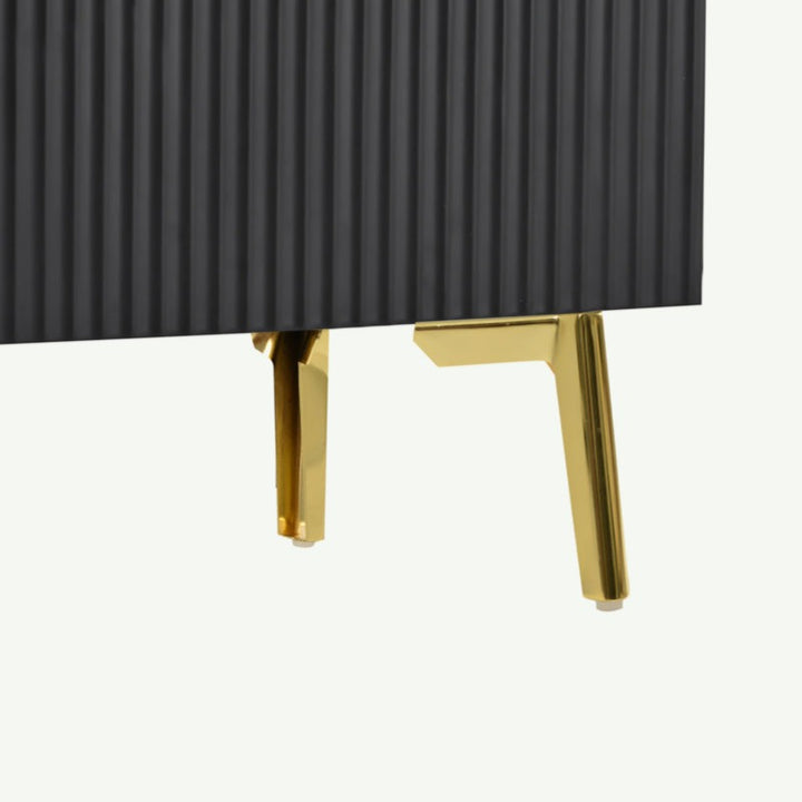 golden legs of black tv unit