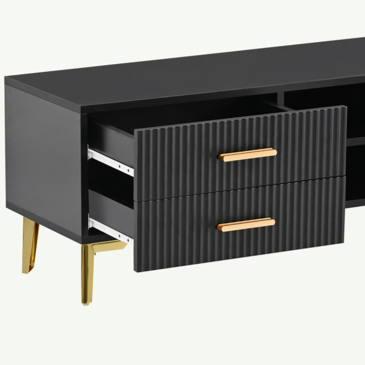 open drawers of black tv unit