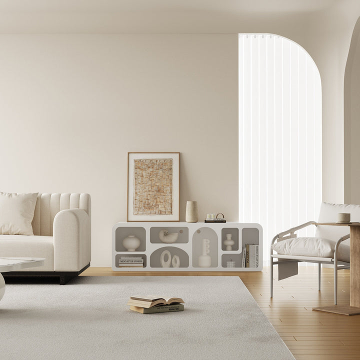 Modern white tv shelf with open shelves for storage