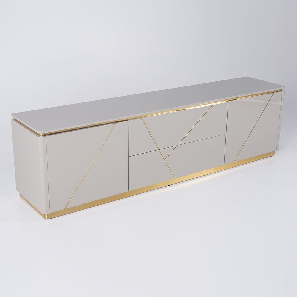 The premium TV stand with gold finish features 2 doors and 2 drawers on a white background