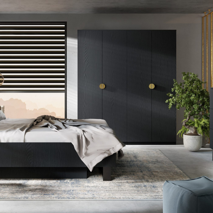 Modern bedroom setup featuring matte black four-door wardrobe with contemporary decor