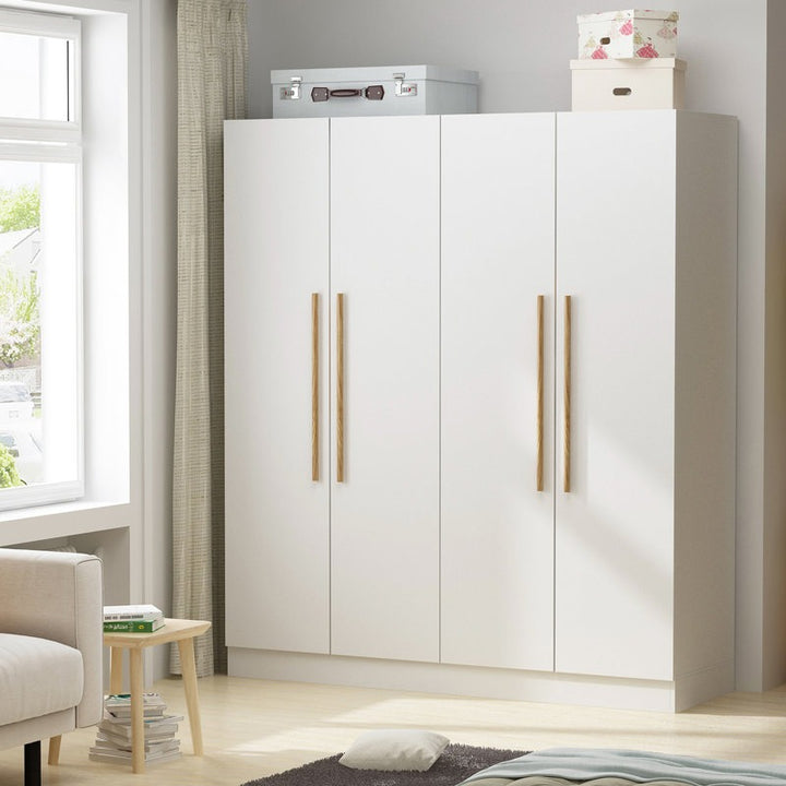 A matte white 4-door wardrobe with wooden handles.
