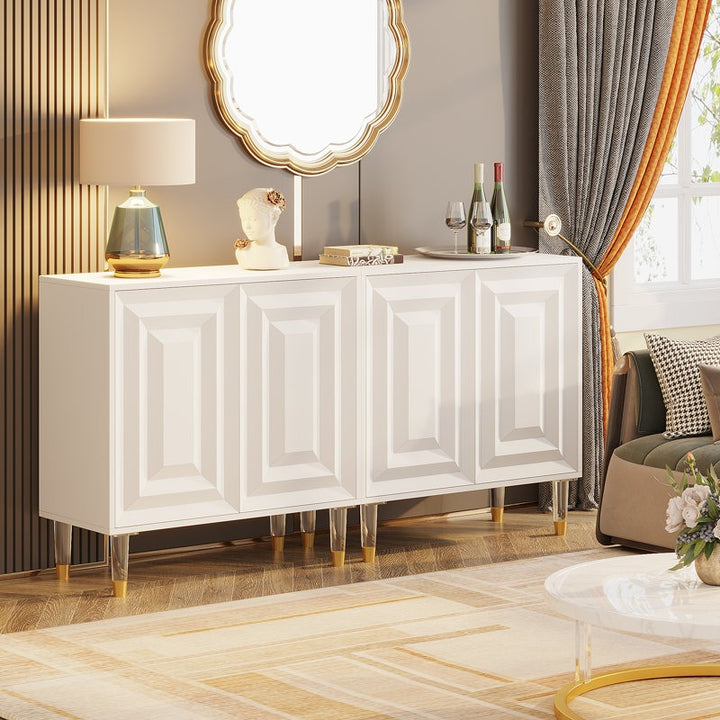 A premium white cabinet with a 3D geometric design and gold-acrylic legs  placed in a living room