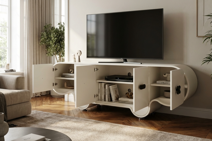 Modern white entertainment console with a TV in a living room setting